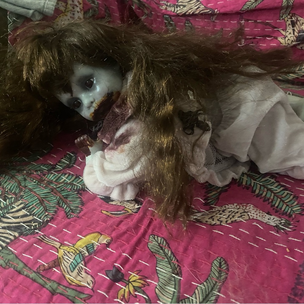Vintage Porcelain Doll with Brown Hair and Pink Dress